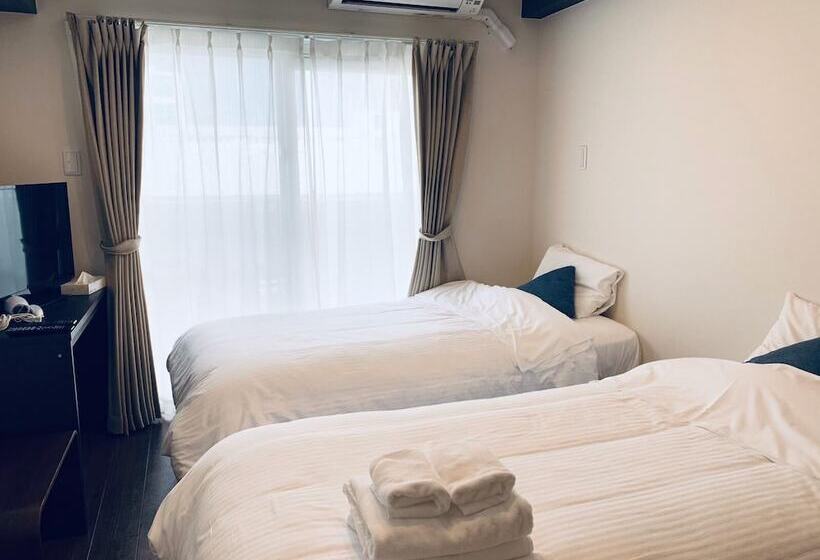 Mr. Kinjo Satomo In Ginowan