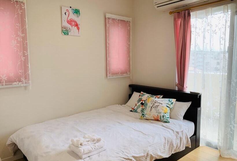 Mr. Kinjo Satomo In Ginowan