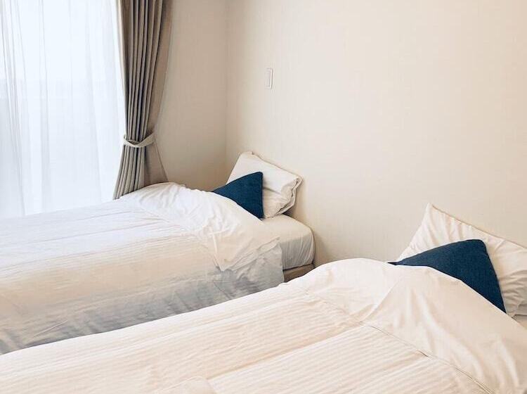 Mr. Kinjo Satomo In Ginowan