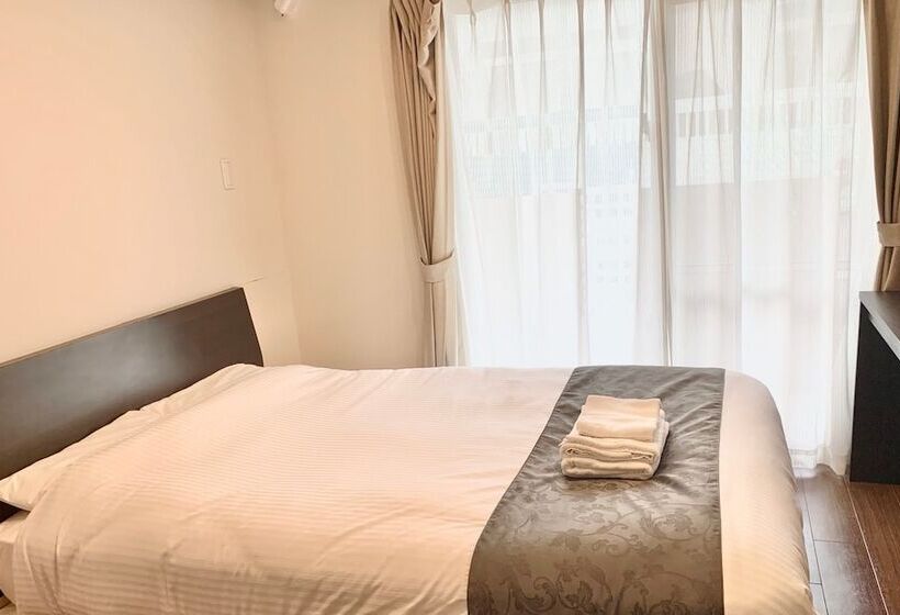 Mr. Kinjo Satomo In Ginowan