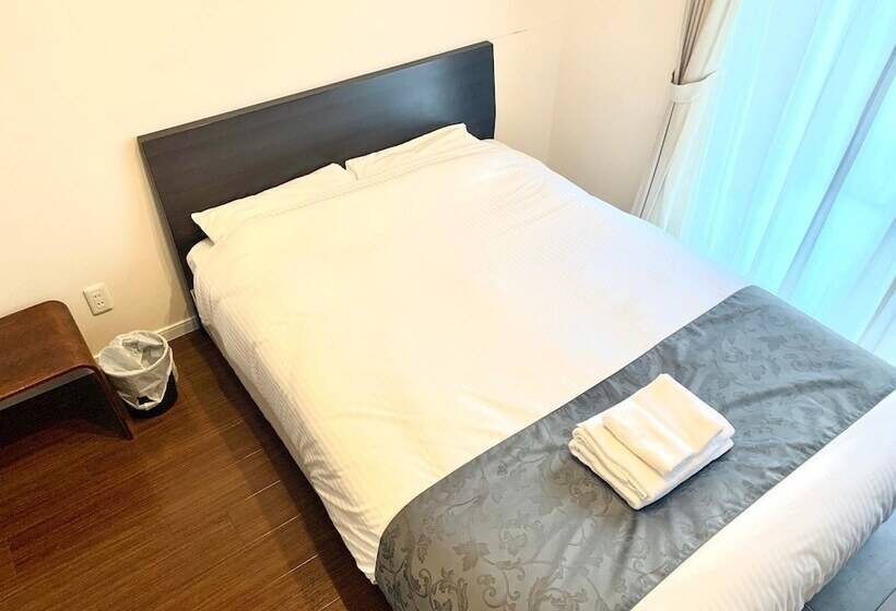 Mr. Kinjo Satomo In Ginowan