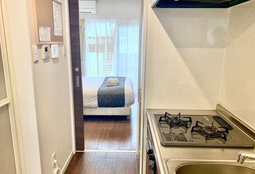 Mr. Kinjo Satomo In Ginowan