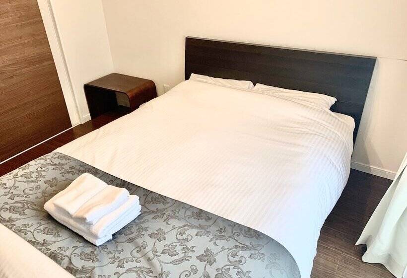 Mr. Kinjo Satomo In Ginowan