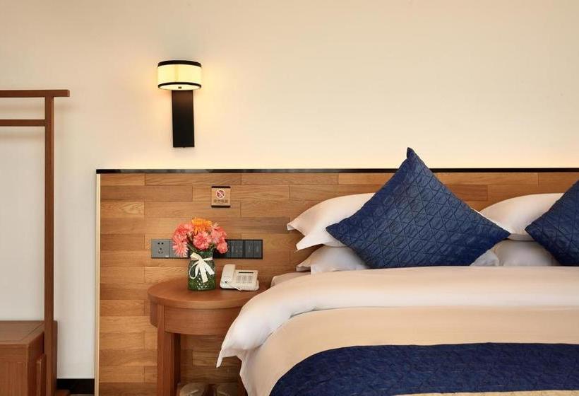 Отель Lijiang Puyuan Jingshe