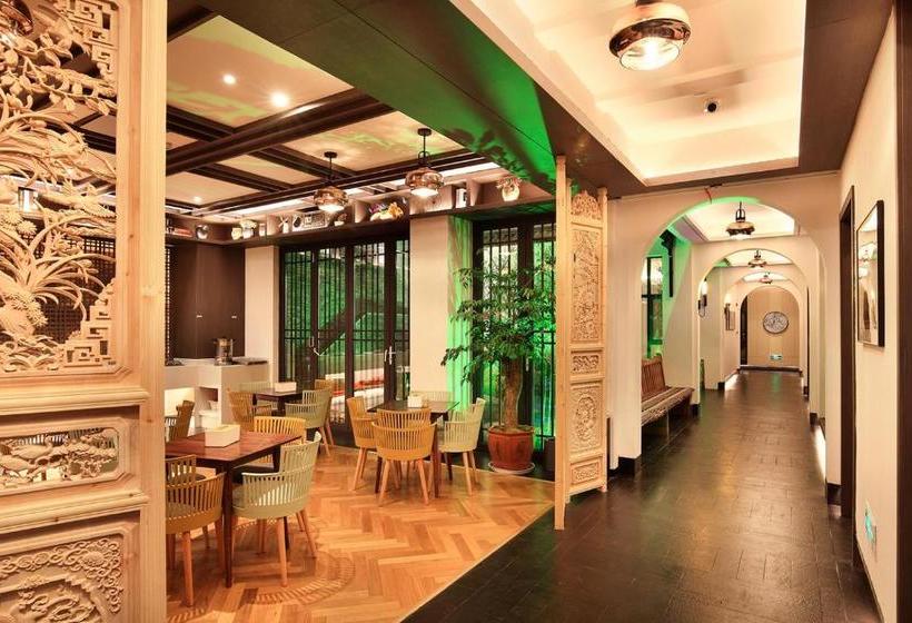 Отель Lijiang Puyuan Jingshe