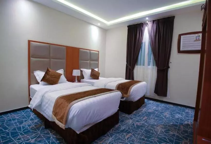 هتل Loluat Al Matar Furnished Units