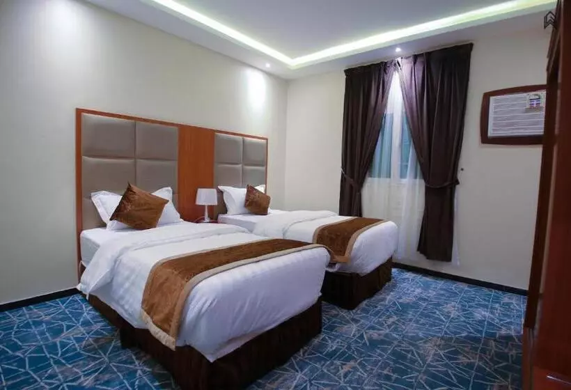 هتل Loluat Al Matar Furnished Units