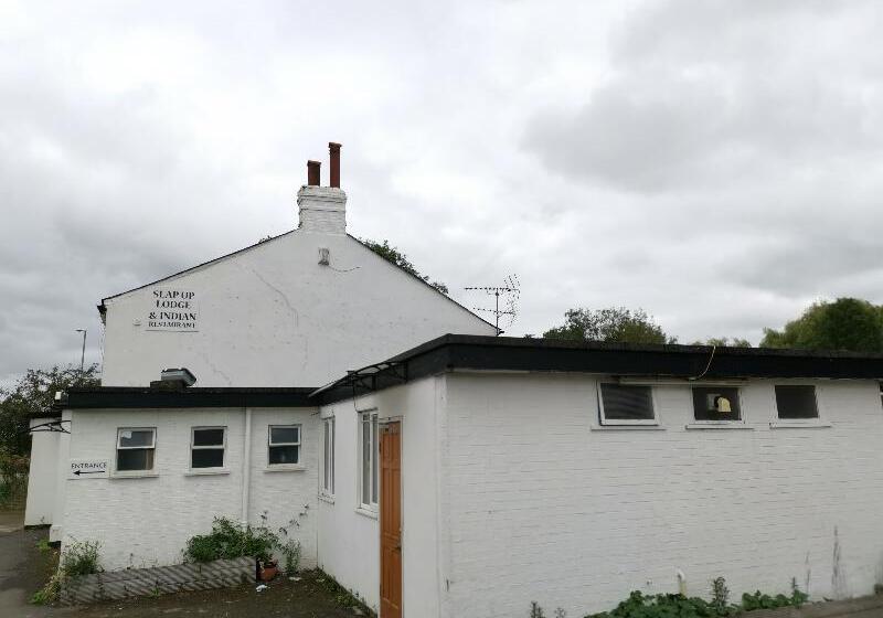 فندق Slap Up Lodge