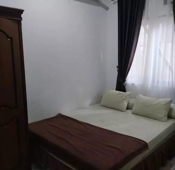 ホテル Oyo 3133 Wisma Yampi Syari Ah