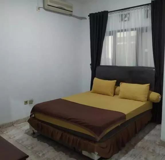 ホテル Oyo 3133 Wisma Yampi Syari Ah