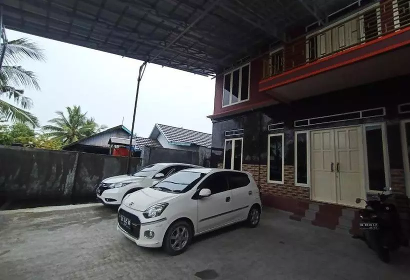 ホテル Spot On 3525 Penginapan Magnolia Syariah