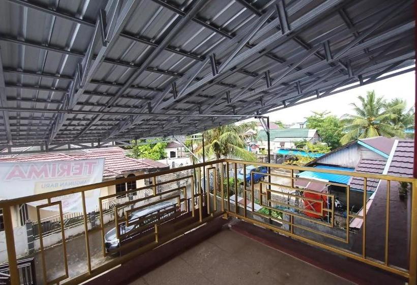 ホテル Spot On 3525 Penginapan Magnolia Syariah