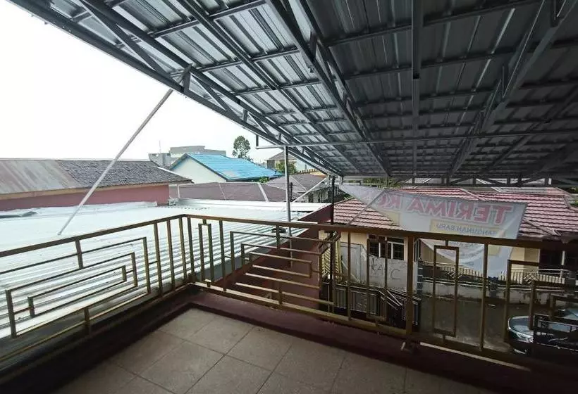 ホテル Spot On 3525 Penginapan Magnolia Syariah