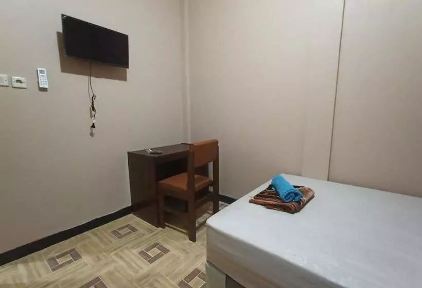 ホテル Spot On 3525 Penginapan Magnolia Syariah