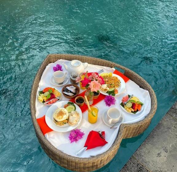 Отель The Sawah Resort & Villa