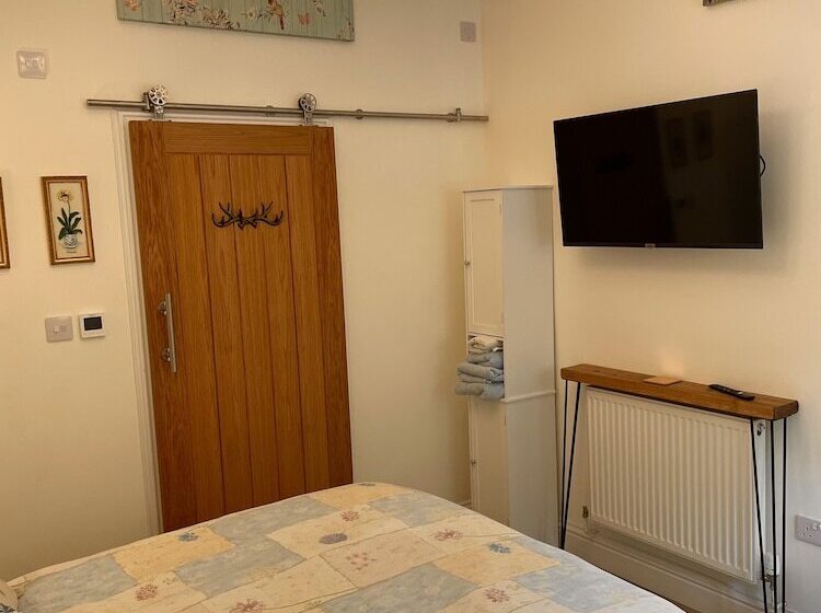 مبيت وإفطار Hunt House Quarters