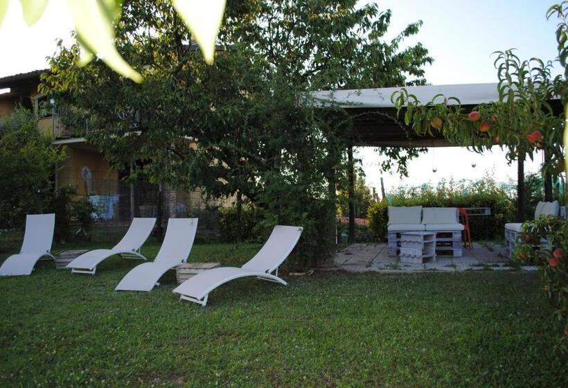 Отель Casa Arcobaleno Apartments Room Holiday Home