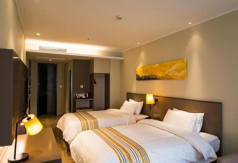 فندق Home Inn Plus Suzhou Wujiang Fenhu Luxin Avenue