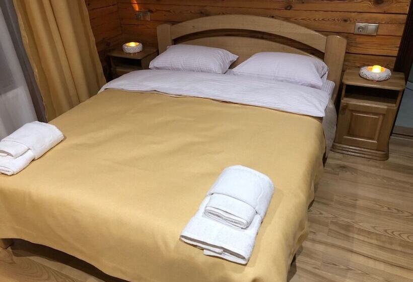 تختخواب و صبحانه Golden Nest