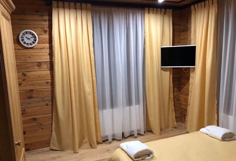 تختخواب و صبحانه Golden Nest