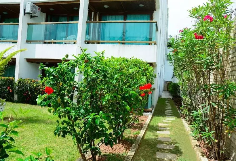 Отель Condomínio Araça Praia Flat, Apt