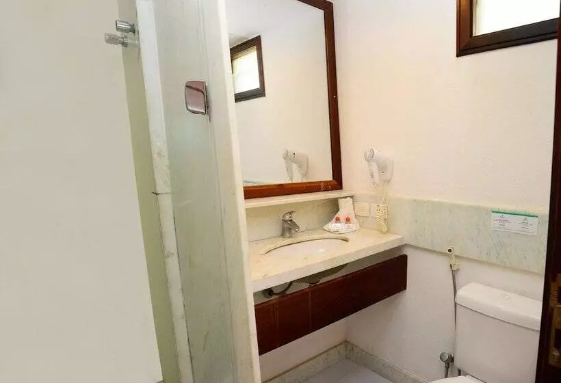 Отель Condomínio Araça Praia Flat, Apt