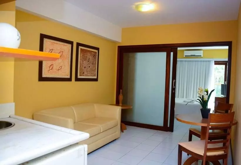 Отель Condomínio Araça Praia Flat, Apt