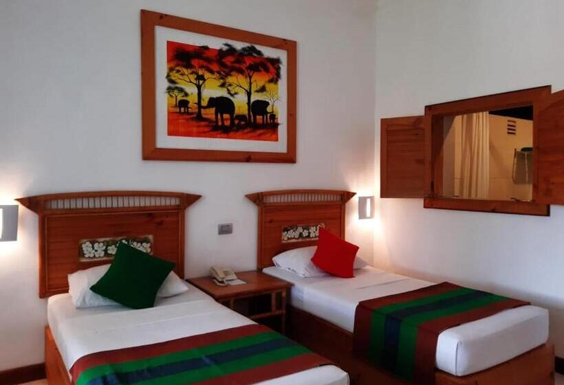 Отель The Oasis Beach Resort