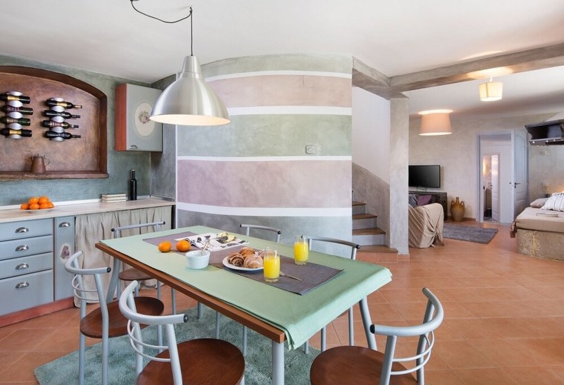 Surrounded By Beautiful Mediterranean Vegetation And The Crystal Clear Sea