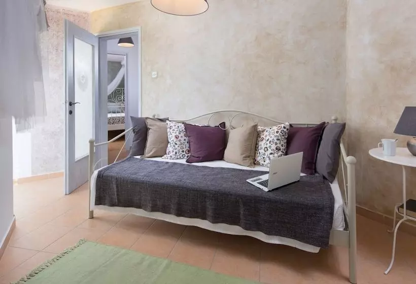 Surrounded By Beautiful Mediterranean Vegetation And The Crystal Clear Sea
