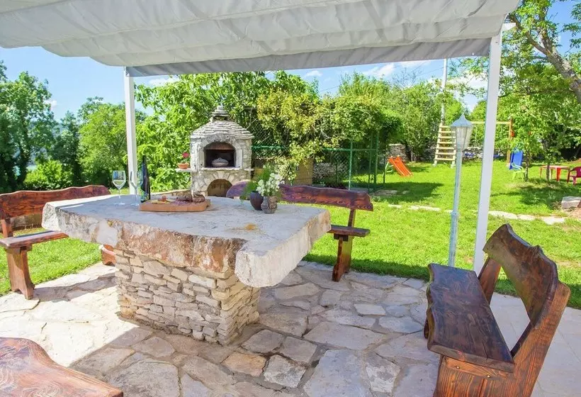 Surrounded By Beautiful Mediterranean Vegetation And The Crystal Clear Sea