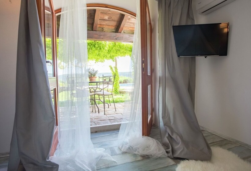 Surrounded By Beautiful Mediterranean Vegetation And The Crystal Clear Sea