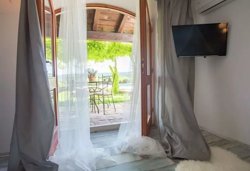 Surrounded By Beautiful Mediterranean Vegetation And The Crystal Clear Sea