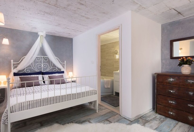 Surrounded By Beautiful Mediterranean Vegetation And The Crystal Clear Sea