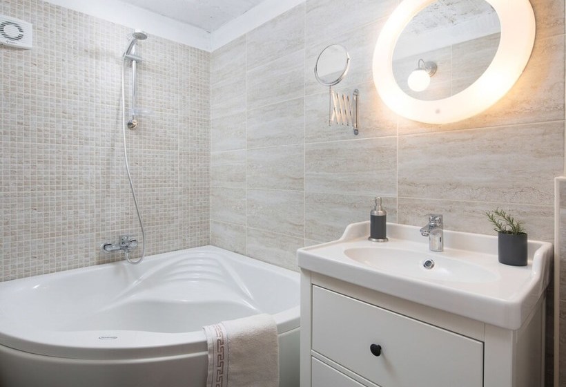 Surrounded By Beautiful Mediterranean Vegetation And The Crystal Clear Sea