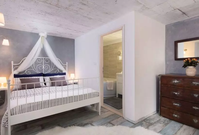 Surrounded By Beautiful Mediterranean Vegetation And The Crystal Clear Sea
