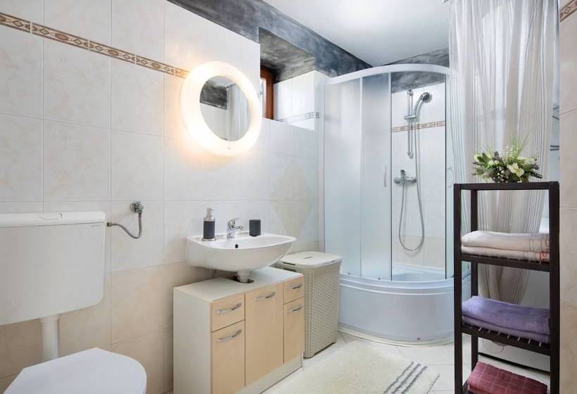 Surrounded By Beautiful Mediterranean Vegetation And The Crystal Clear Sea