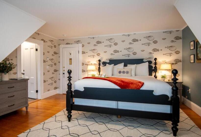 هتل Sand Bar Cottage Inn