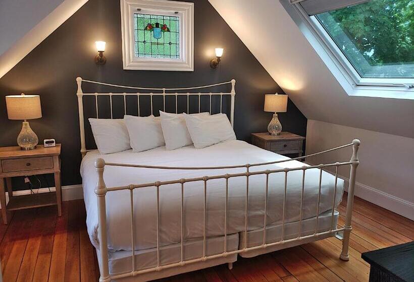 هتل Sand Bar Cottage Inn