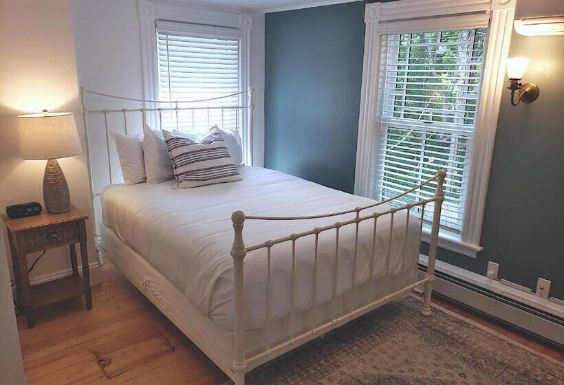 هتل Sand Bar Cottage Inn