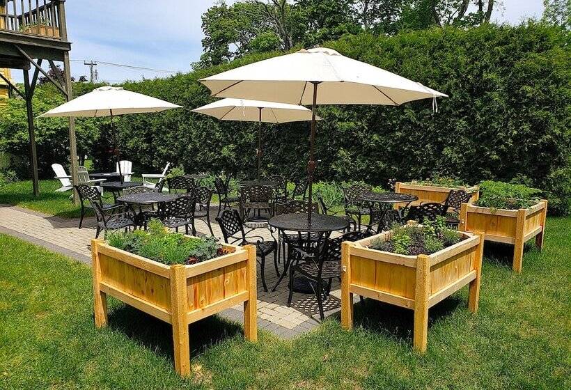 هتل Sand Bar Cottage Inn