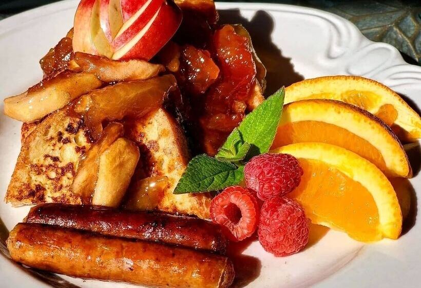 هتل Sand Bar Cottage Inn