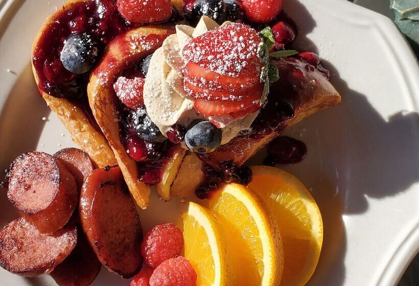 هتل Sand Bar Cottage Inn