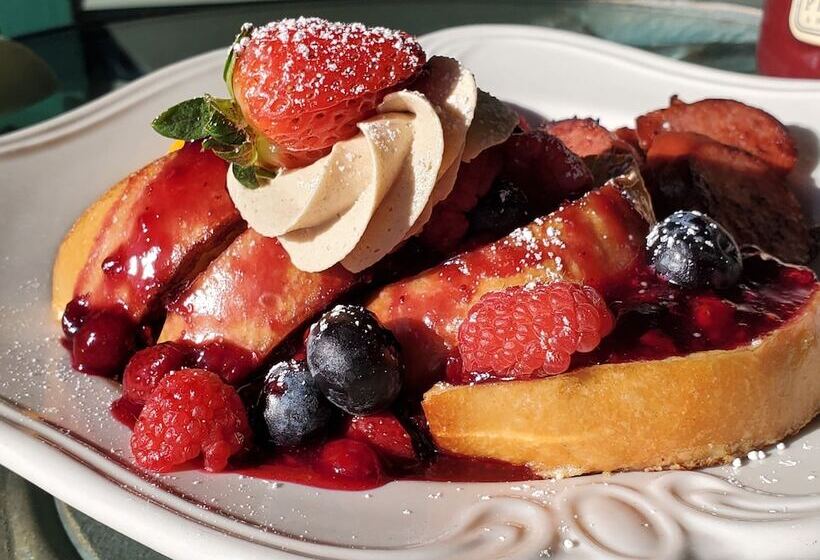 هتل Sand Bar Cottage Inn