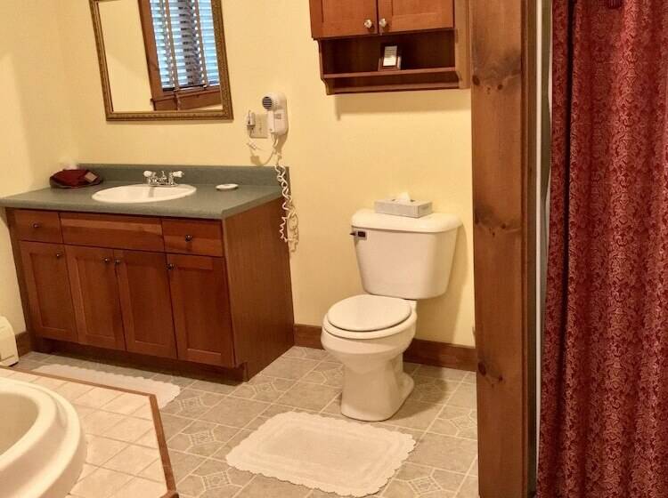 هتل Sand Bar Cottage Inn