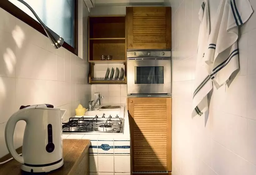 اقامتگاه Roccamare Resort   Ville E Appartamenti