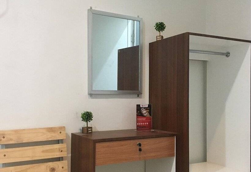 בית מלון כפרי Reddoorz Near Institut Kesehatan Helvetia