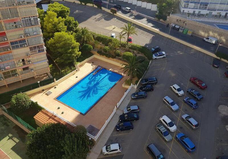 Epic Views Across Benidorm  Walk To The Beach  Tennis Court  Pool  Sleeps 4  Wifi & Netflix Plus Air