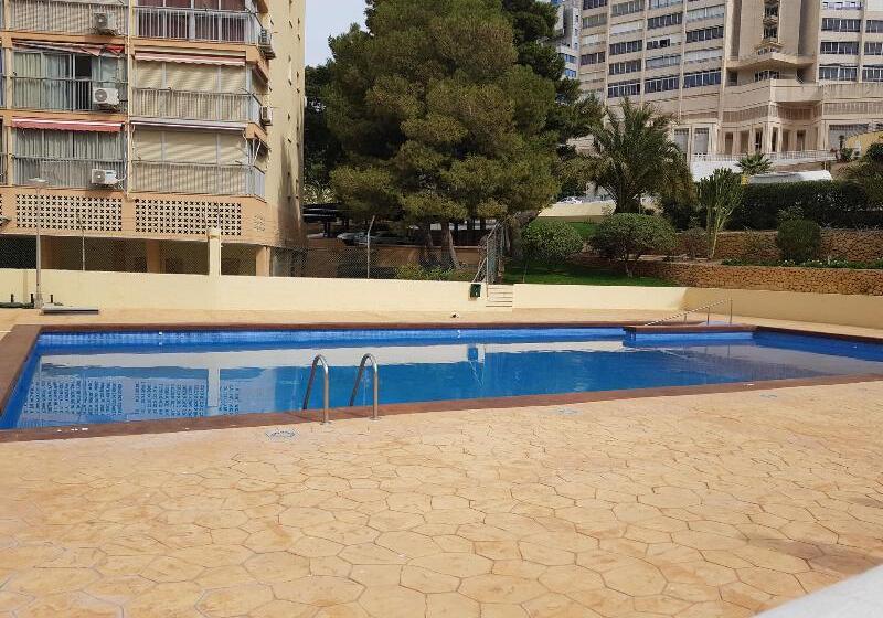 Epic Views Across Benidorm  Walk To The Beach  Tennis Court  Pool  Sleeps 4  Wifi & Netflix Plus Air