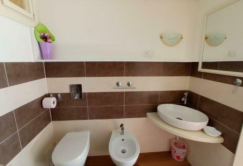 تختخواب و صبحانه La Pervinca